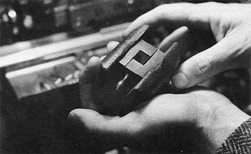 Photograph of the original Sun Hing Foundry brass and wood handmold